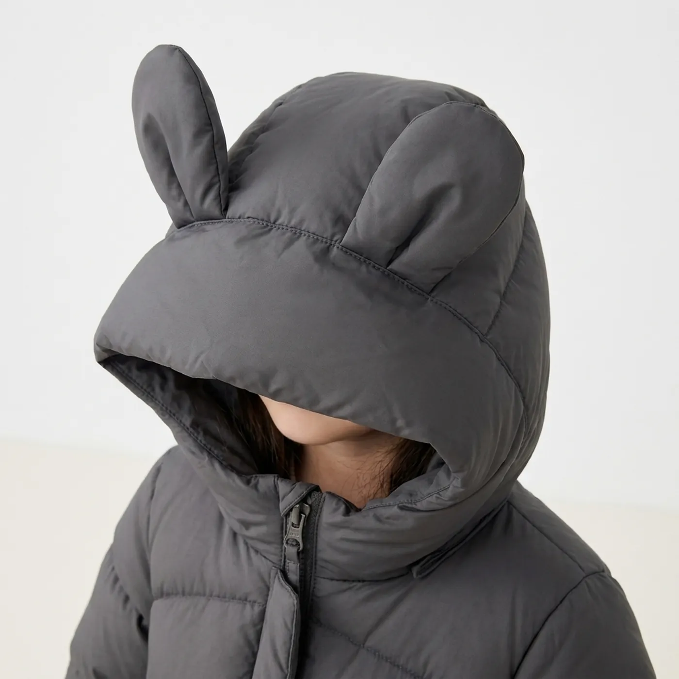 Doudoune longue Oreilles de lapin — Le détail qui fait tout